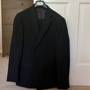 Mens Calvin Klein suit.  Pants are 34 waist 30 Length slim fit.